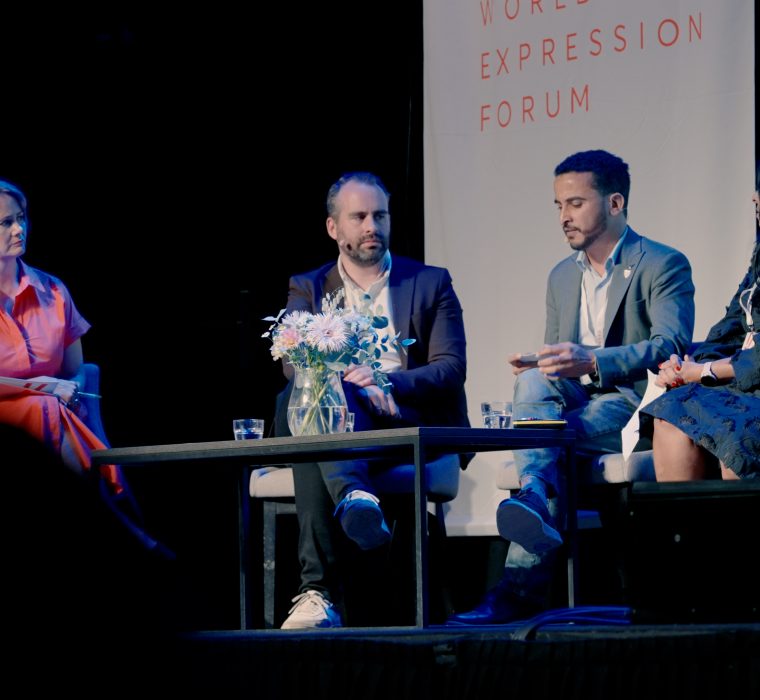 Khaled Emam speaking at the panel discussion 'The Global Free Speech Recession – and How to Fight It' during the WEXFO Take Action conference in Lillehammer, Norway.
